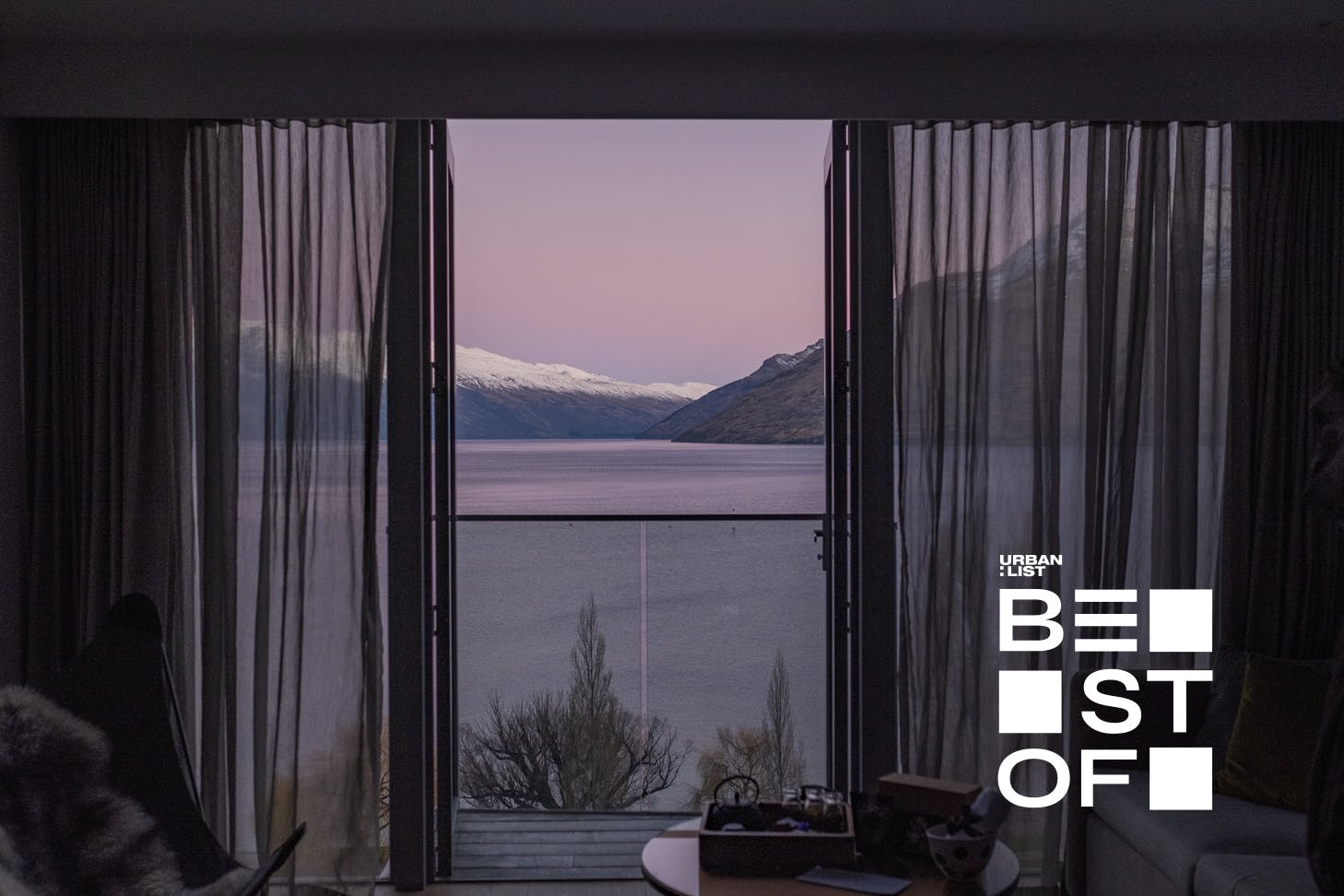 A view over the lake and snow-capped mountains at QT Queenstown, one of the best hotels around.